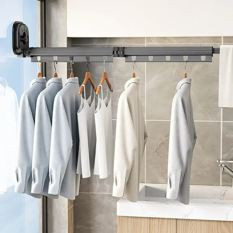 WALL-MOUNTED FOLDABLE CLOTHES DRYING RACK WITH SUCTION CUP